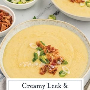 bowl of leek and potato soup with text overlay for pinterest