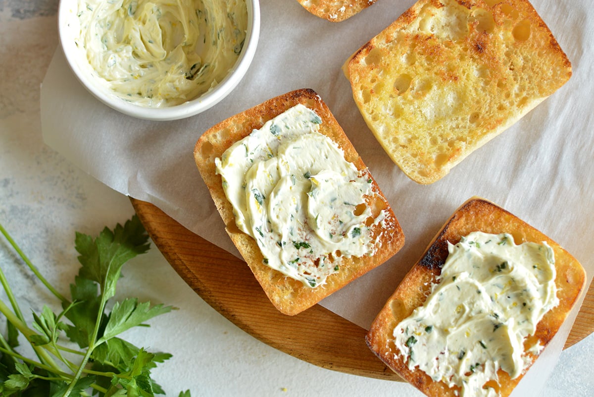 overhead shot of dijon lemon butter spread on bread