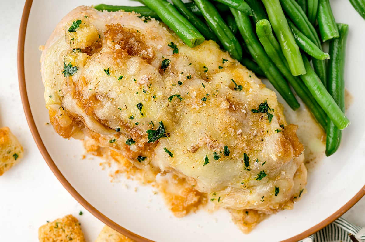 close up of french onion chicken with green beans