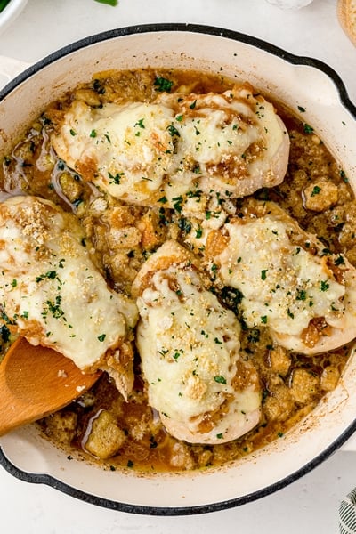 overhead shot of french onion chicken bake in a pan