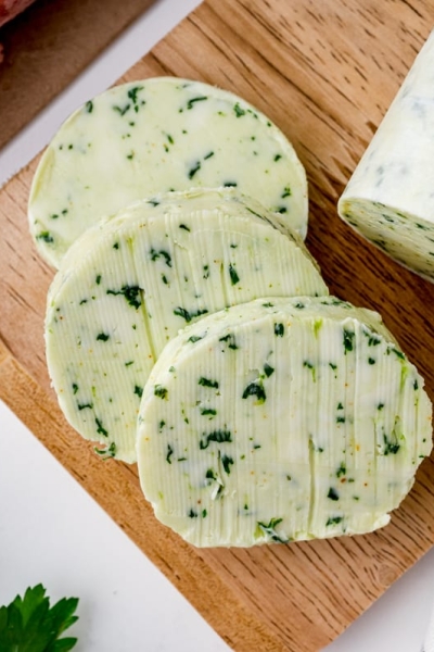 overhead slices of butter on a cutting board