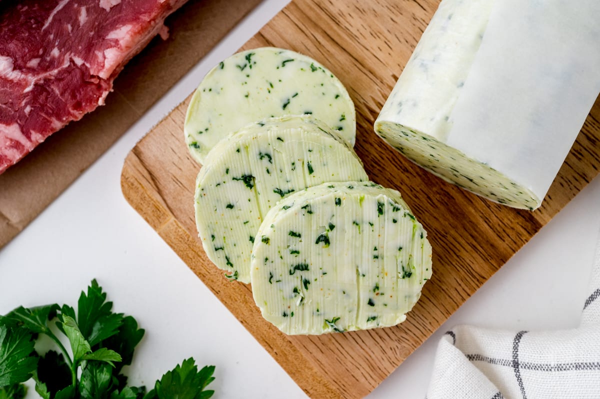 overhead slices of butter on a cutting board