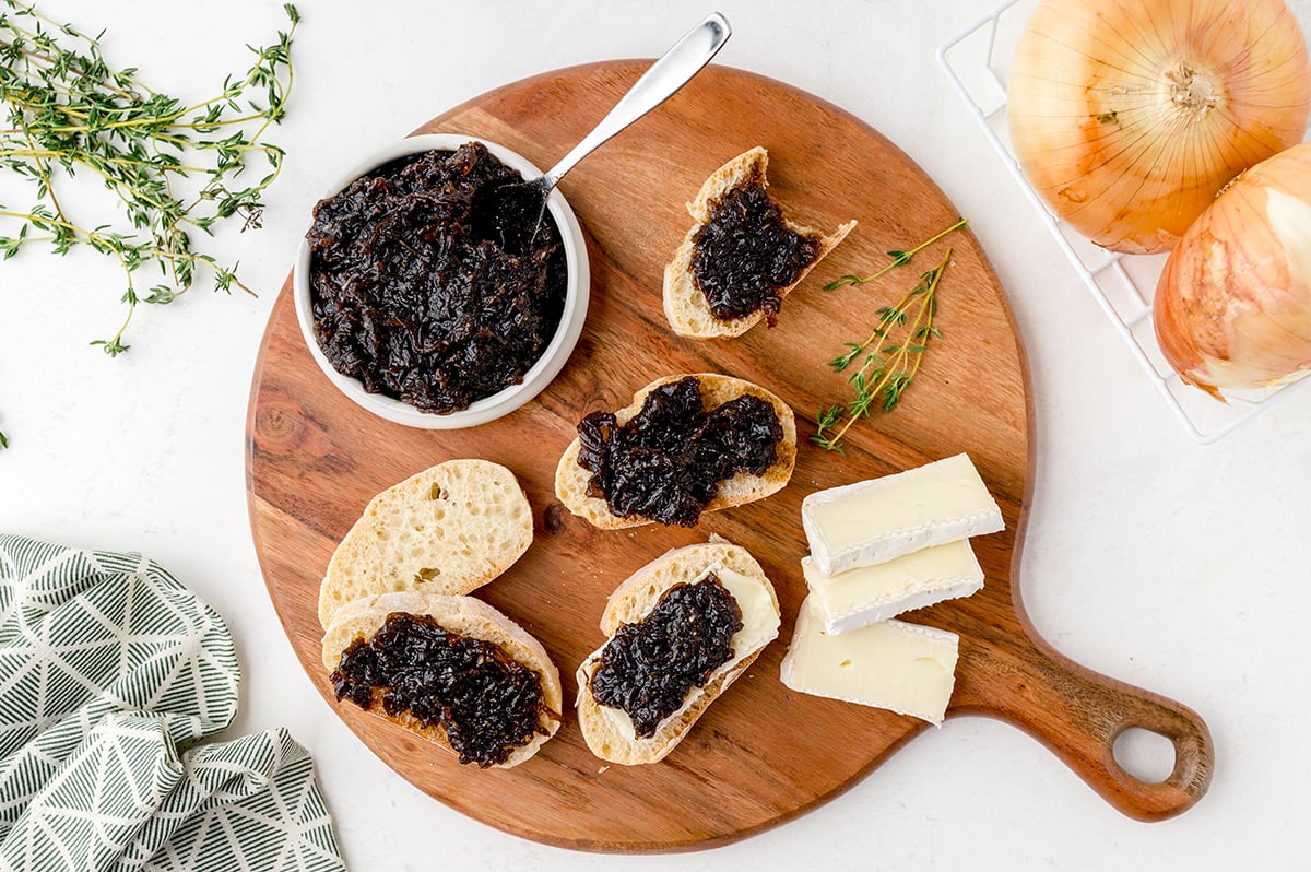 overhead shot of onion jam spread on bread slices