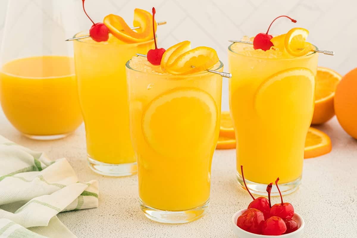 three orange crush cocktails