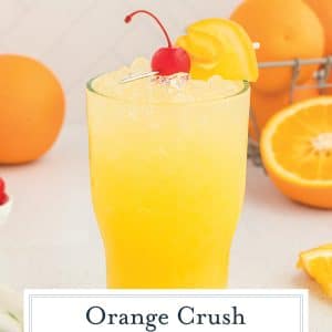 straight on shot of orange crush cocktail with text overlay for pinterest