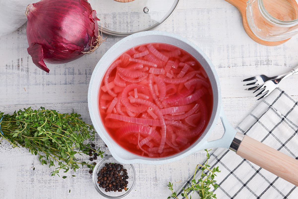 making pickled red onion in a small saucepan 