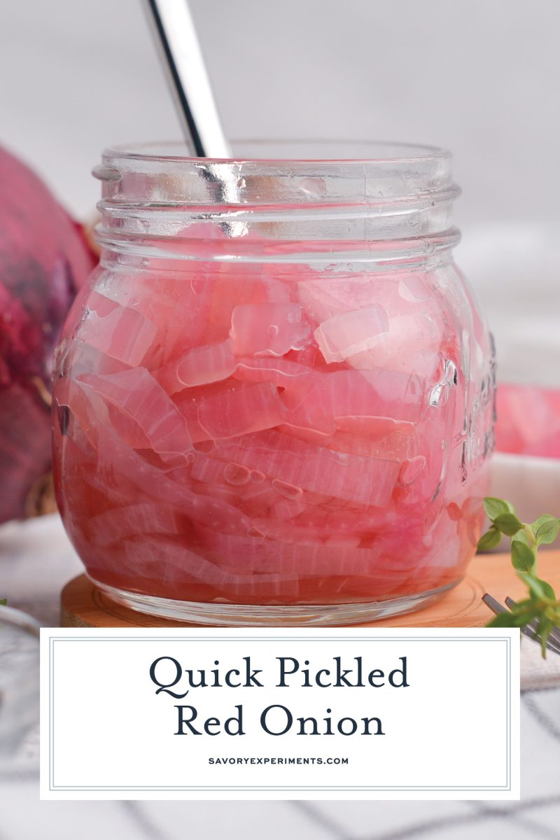close up of pickled red onions with a fork 