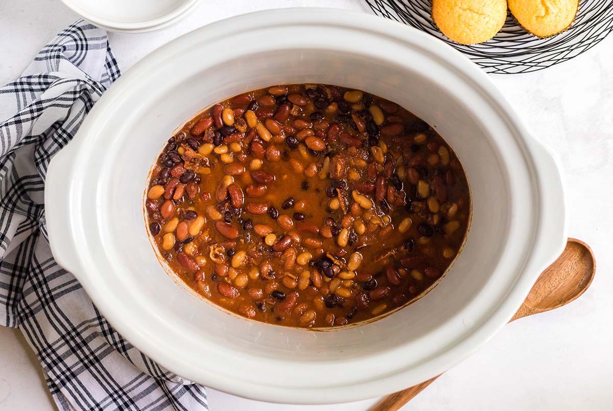 overhead shot of slow cooker baked beans in slow cooker