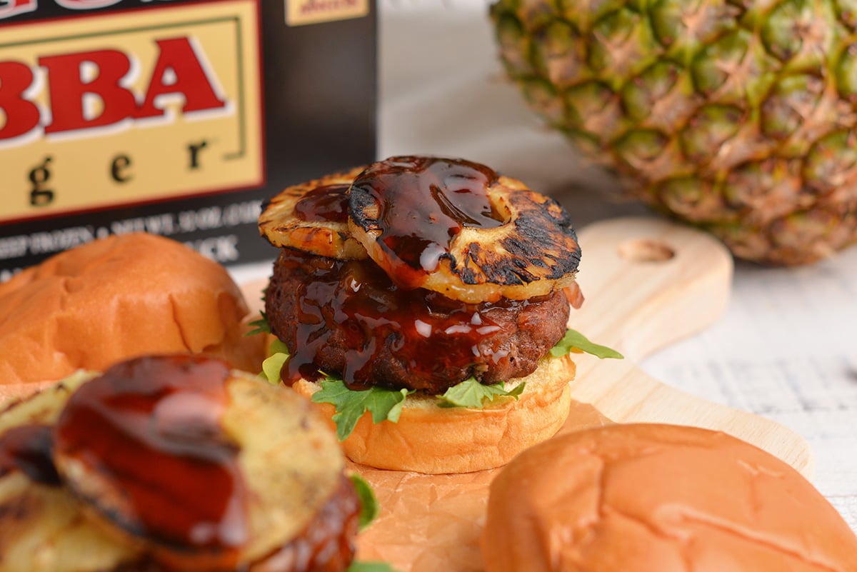 head-on view of a pineapple teriyaki burger without the top bun 
