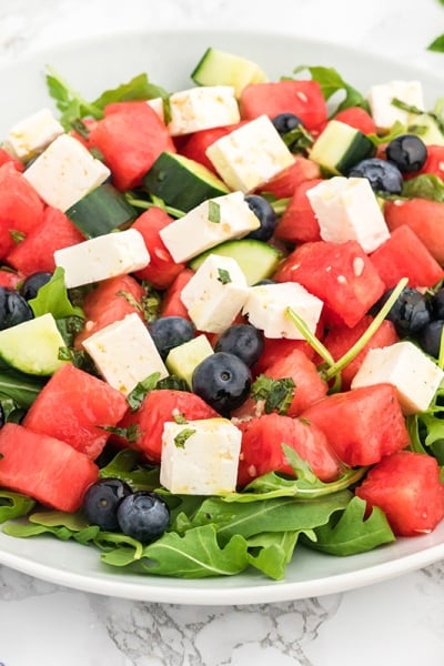 angled shot of watermelon feta salad in a bowl