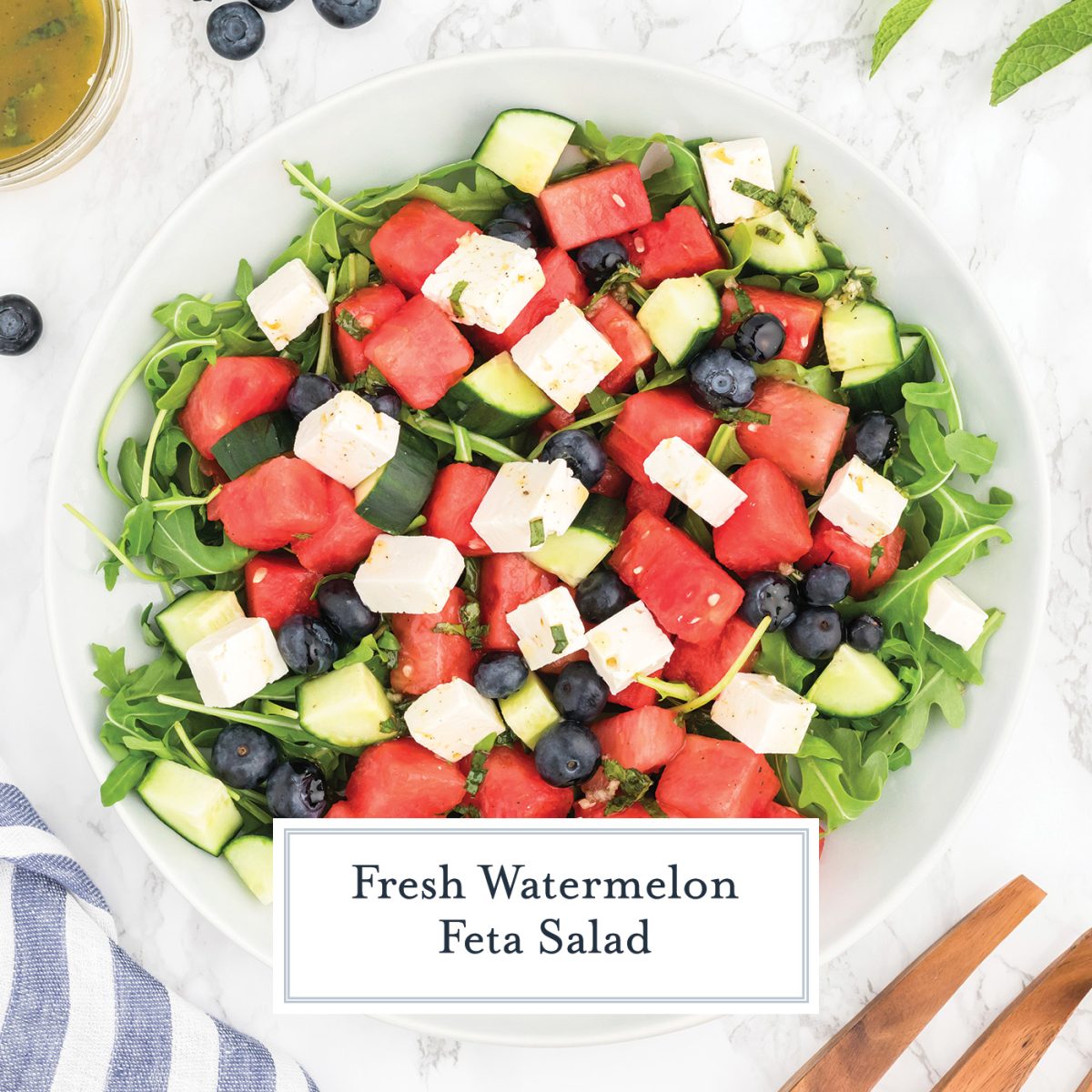 overhead shot of watermelon feta salad with text overlay for facebook