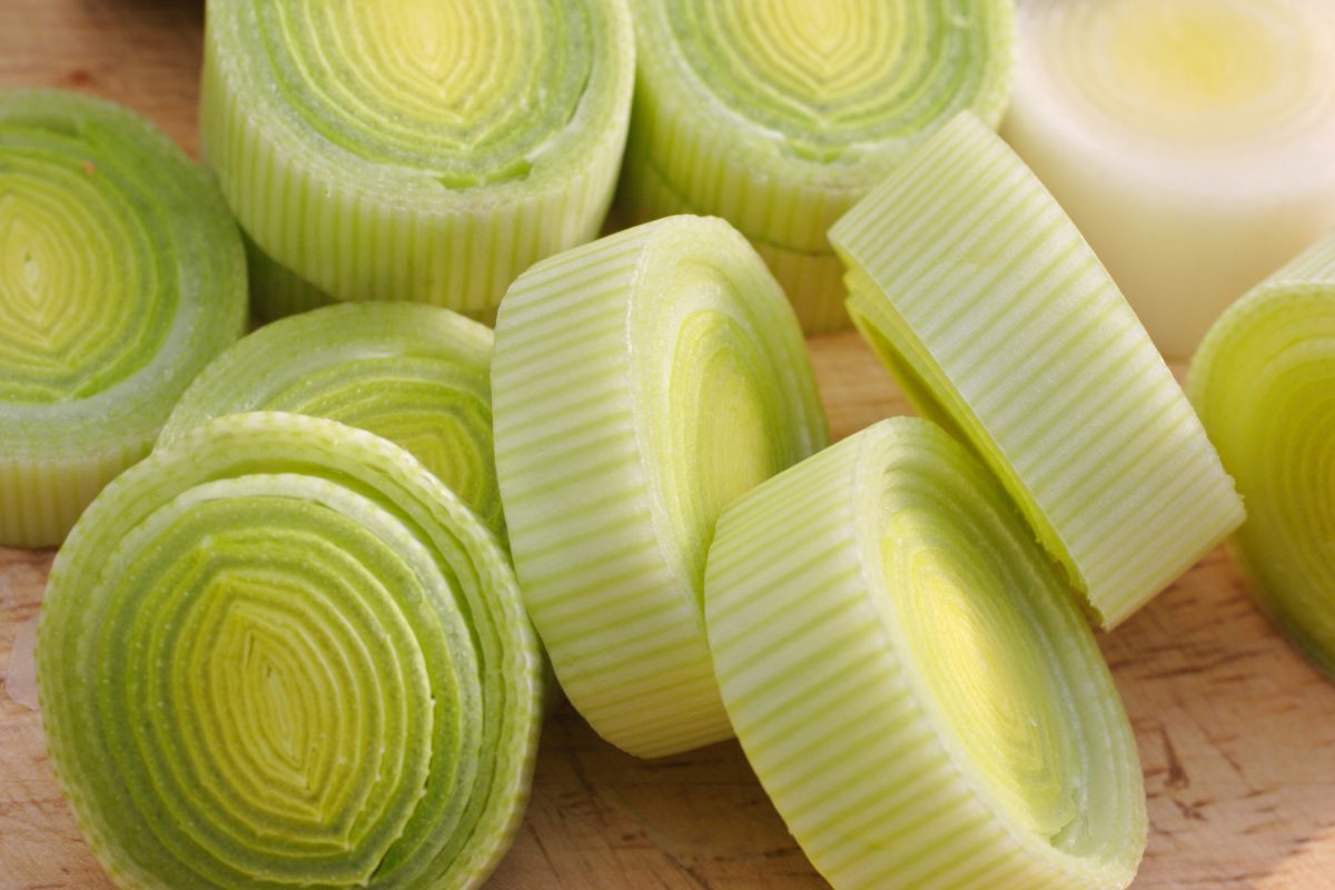 sliced leeks on a cutting board 