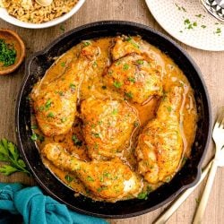 overhead shot of smothered chicken in skillet