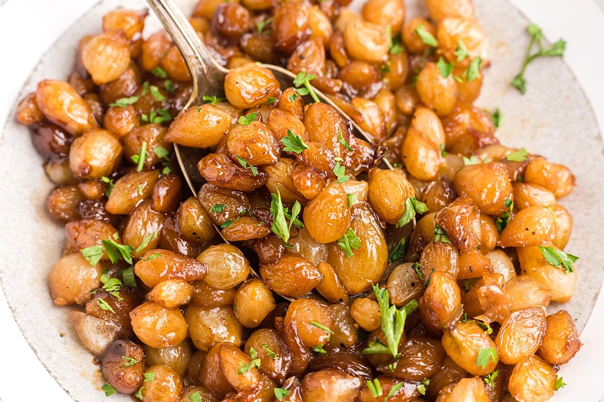 spoon with balsamic pearl onions