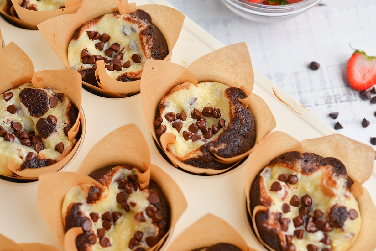 close up of mini chocolate chips on black bottom cupcake