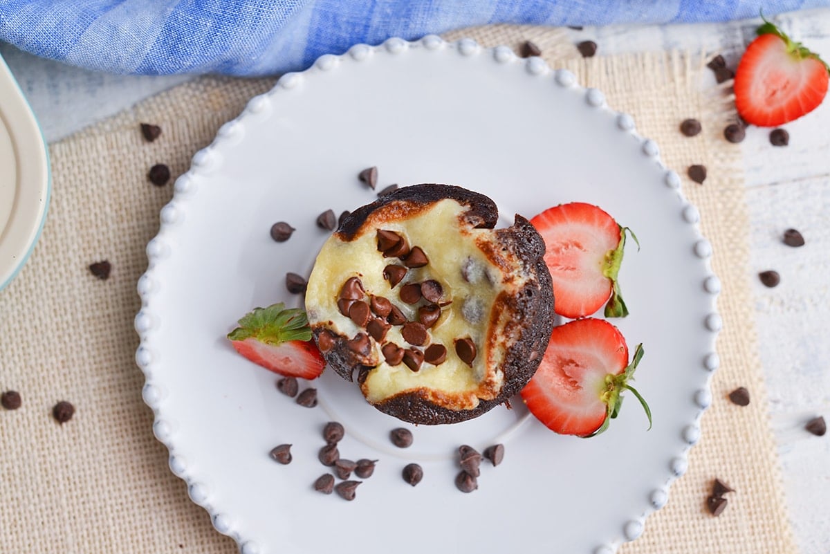 overhead of black bottom cupcake with fresh fruit