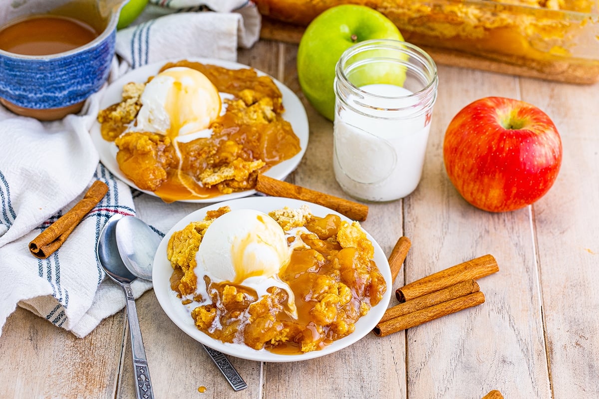 two dishes of caramel apple cake with fresh apples