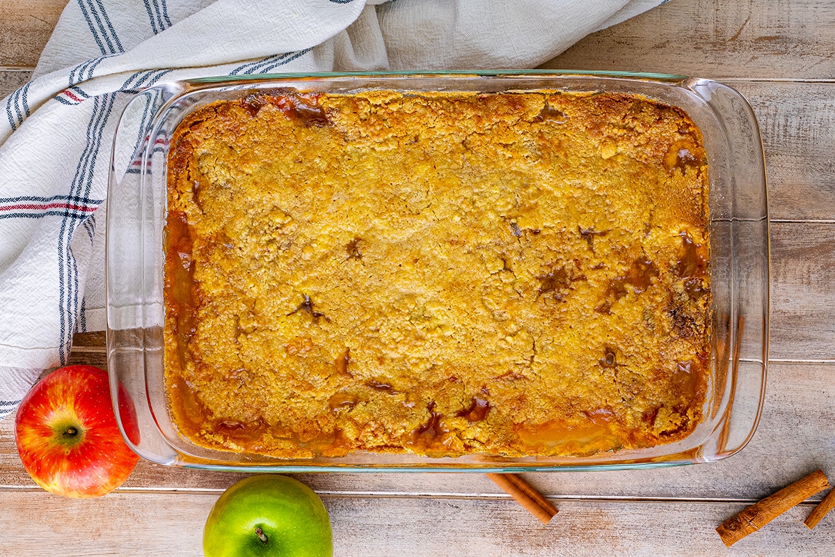 overhead of caramel apple dump cake in a 9x13 baking dish