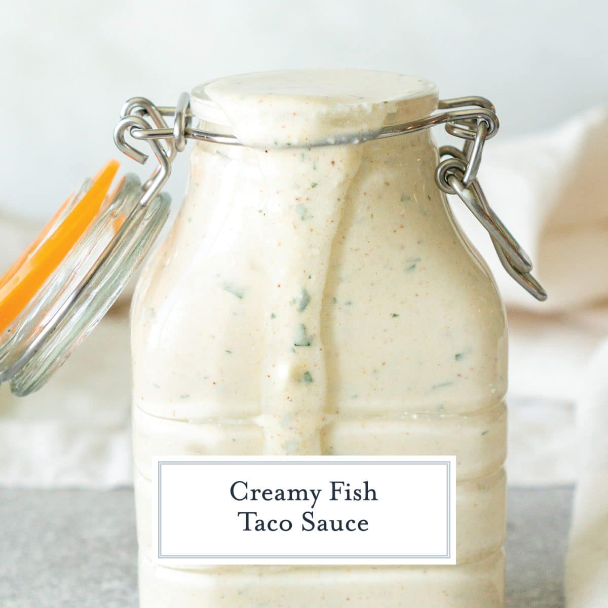 jar of fish taco sauce with text overlay for facebook