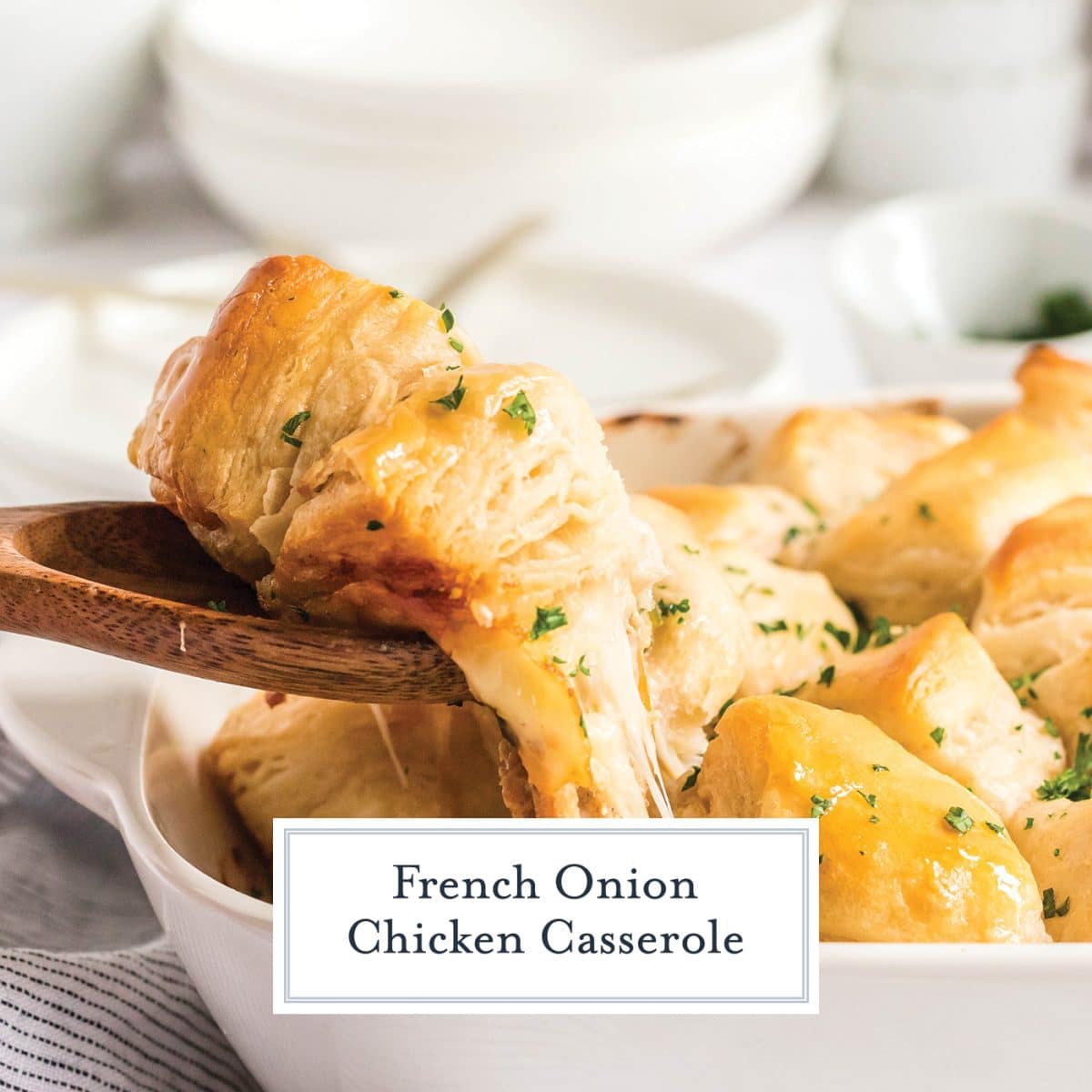 wooden spoon scooping out french onion chicken casserole with text overlay for facebook