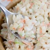 spoon in bowl of macaroni salad