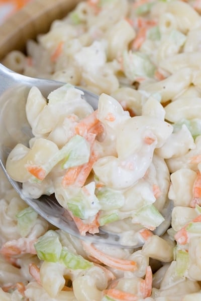 spoon in bowl of macaroni salad