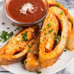 slices of pepperoni stromboli on plate