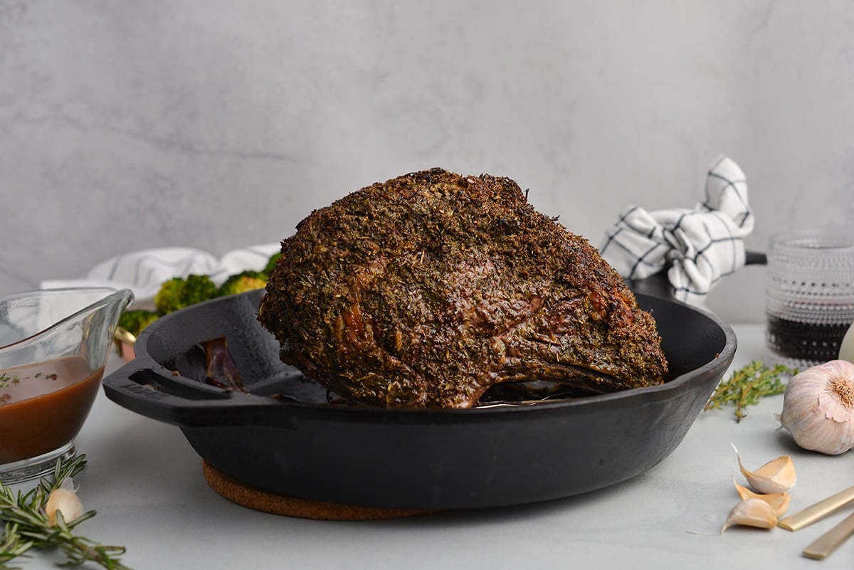 garlic prime rib in a cast iron skillet