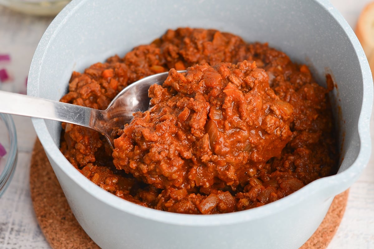 close up spoon of rochester meat sauce