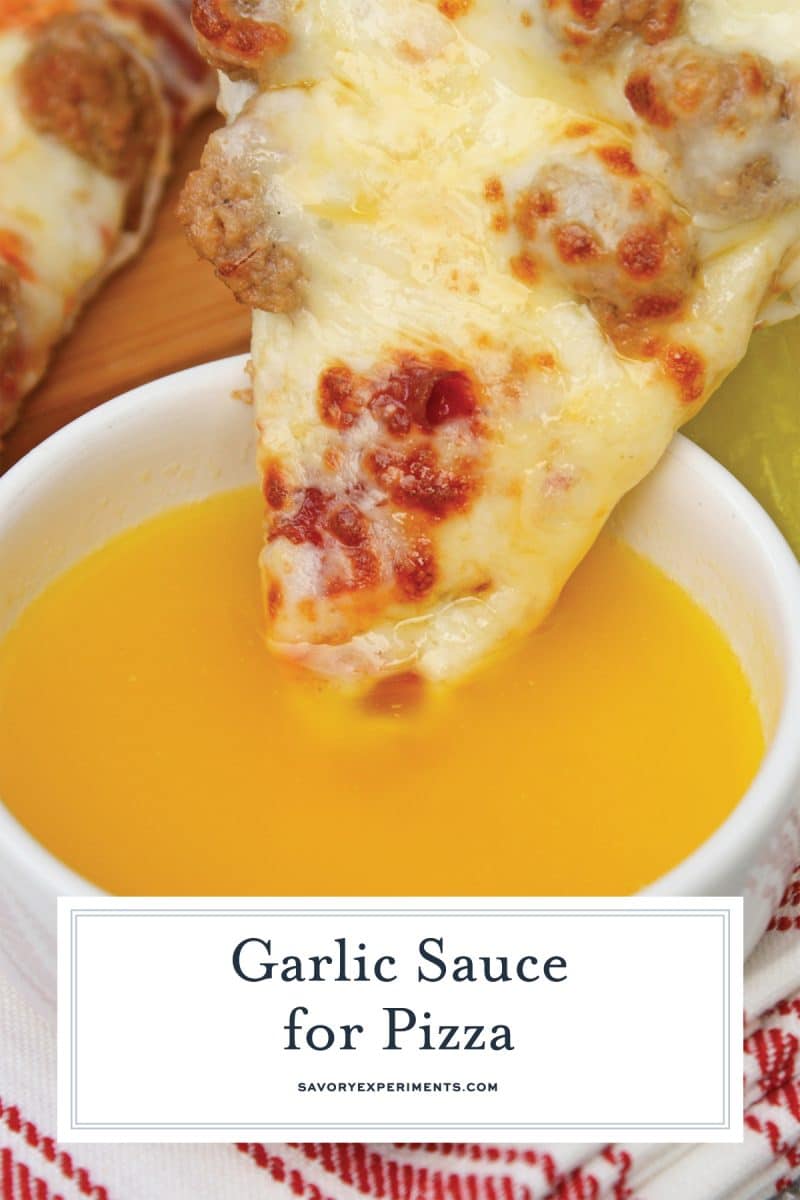 pizza dipping into garlic sauce