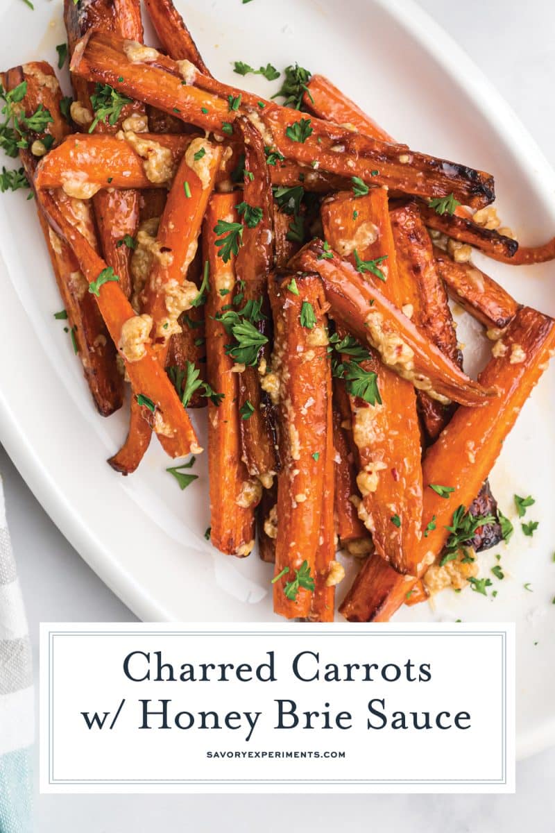 overhead close up of charred carrots with honey brie sauce