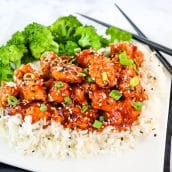 sesame chicken over a bed of rice