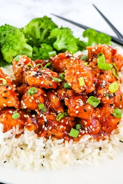 sesame chicken over a bed of rice