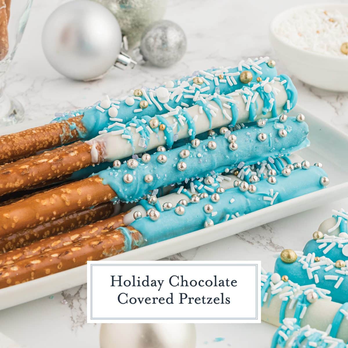 chocolate covered pretzel rods stacked on a plate with text overlay for facebook