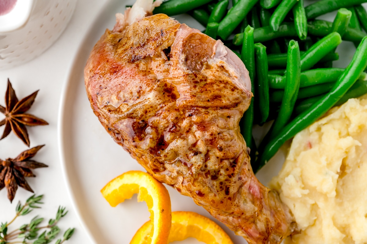 overhead shot of leg of roast turkey with orange thyme rub