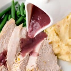 gravy pouring over turkey breast