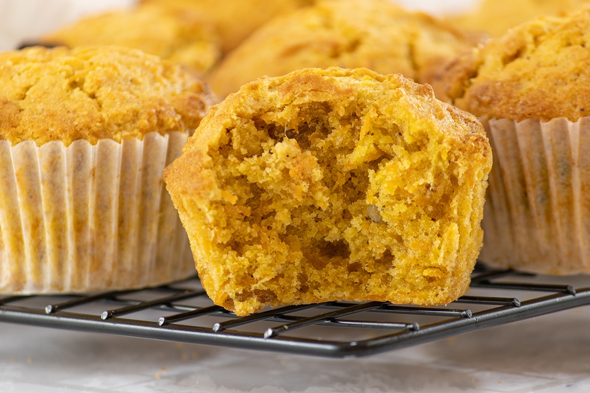 close up of bite taken out of carrot muffin