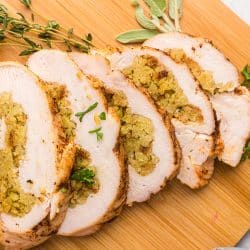 turkey breast sliced on a cutting board