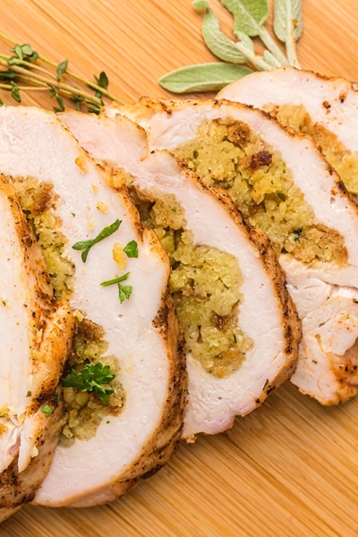 turkey breast sliced on a cutting board