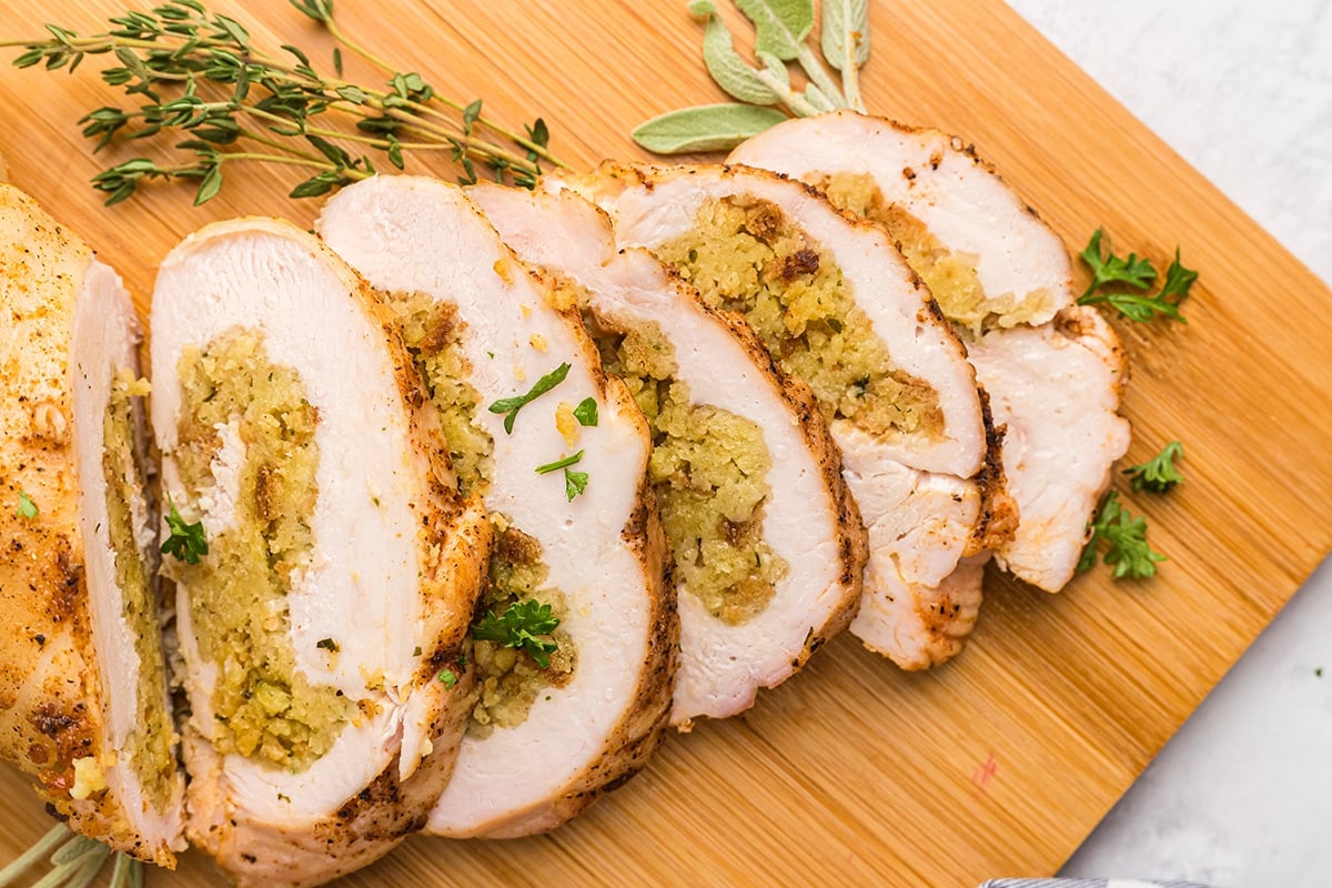 turkey breast sliced on a cutting board