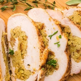 turkey breast sliced on a cutting board