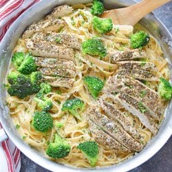 overhead of broccoli chicken alfredo in a skillet