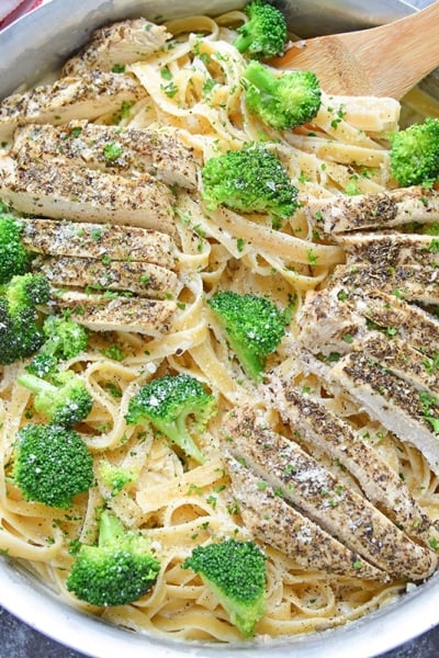 overhead of broccoli chicken alfredo in a skillet