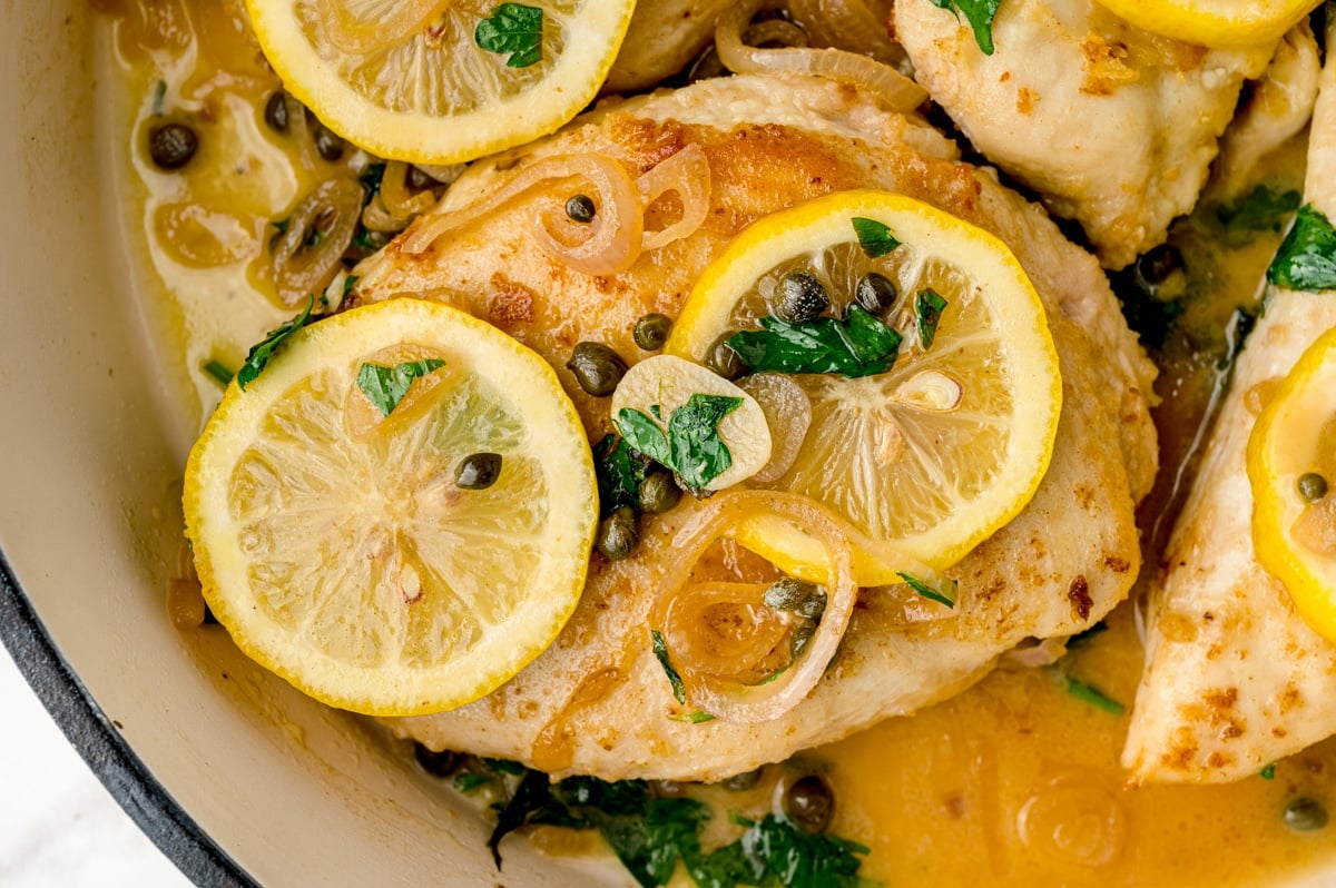 close up of chicken cutlets with piccata sauce