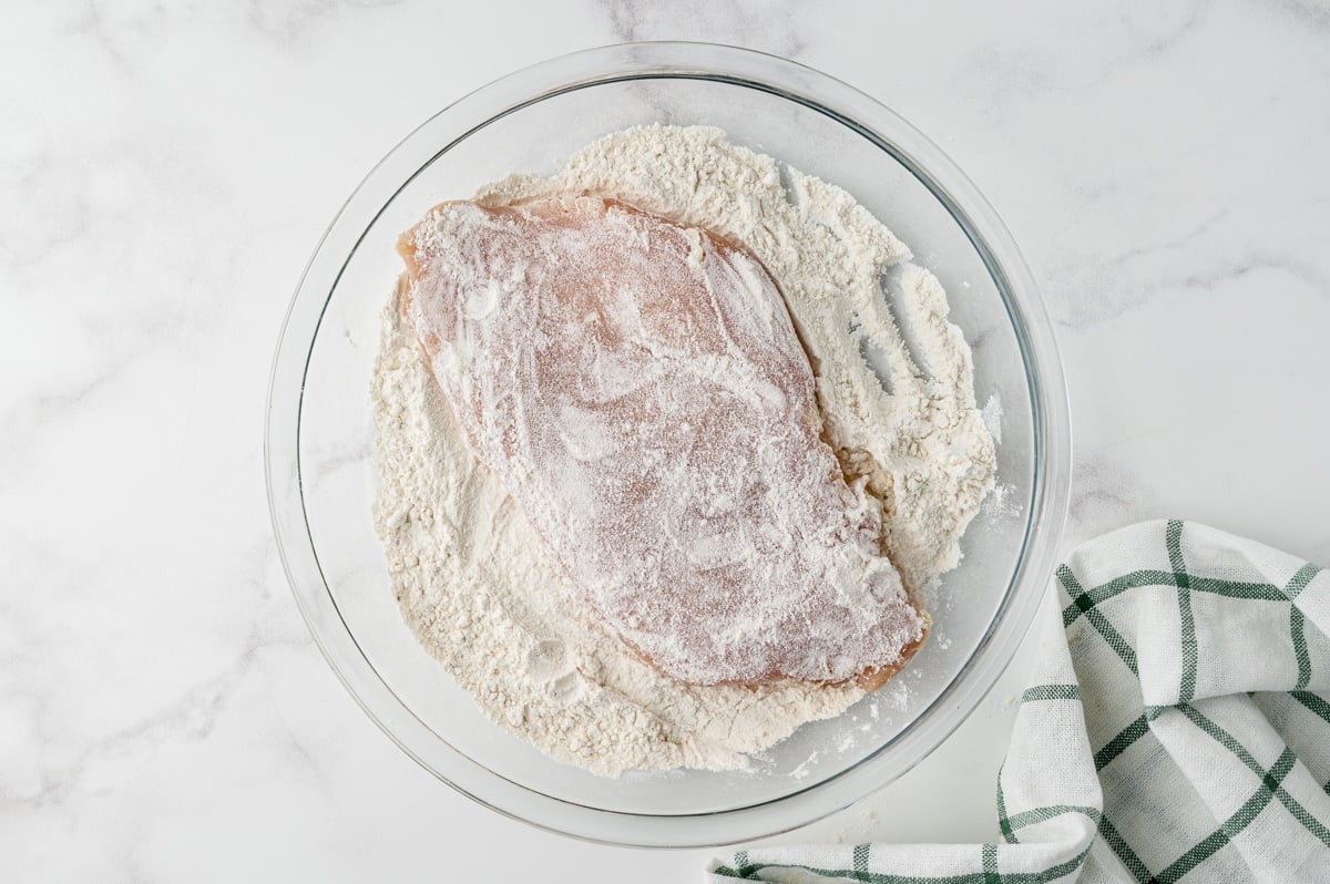 dredging chicken in flour