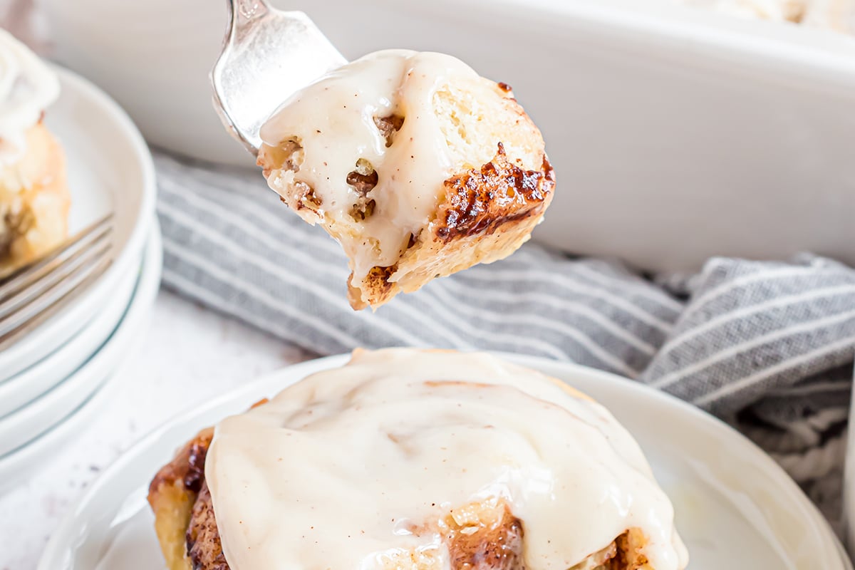 bite of cinnamon roll on a fork