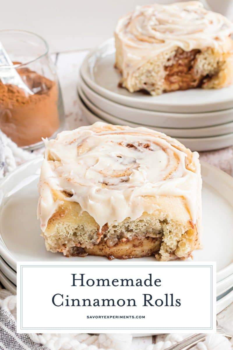 cinnamon roll on a plate with text overlay for pinterest