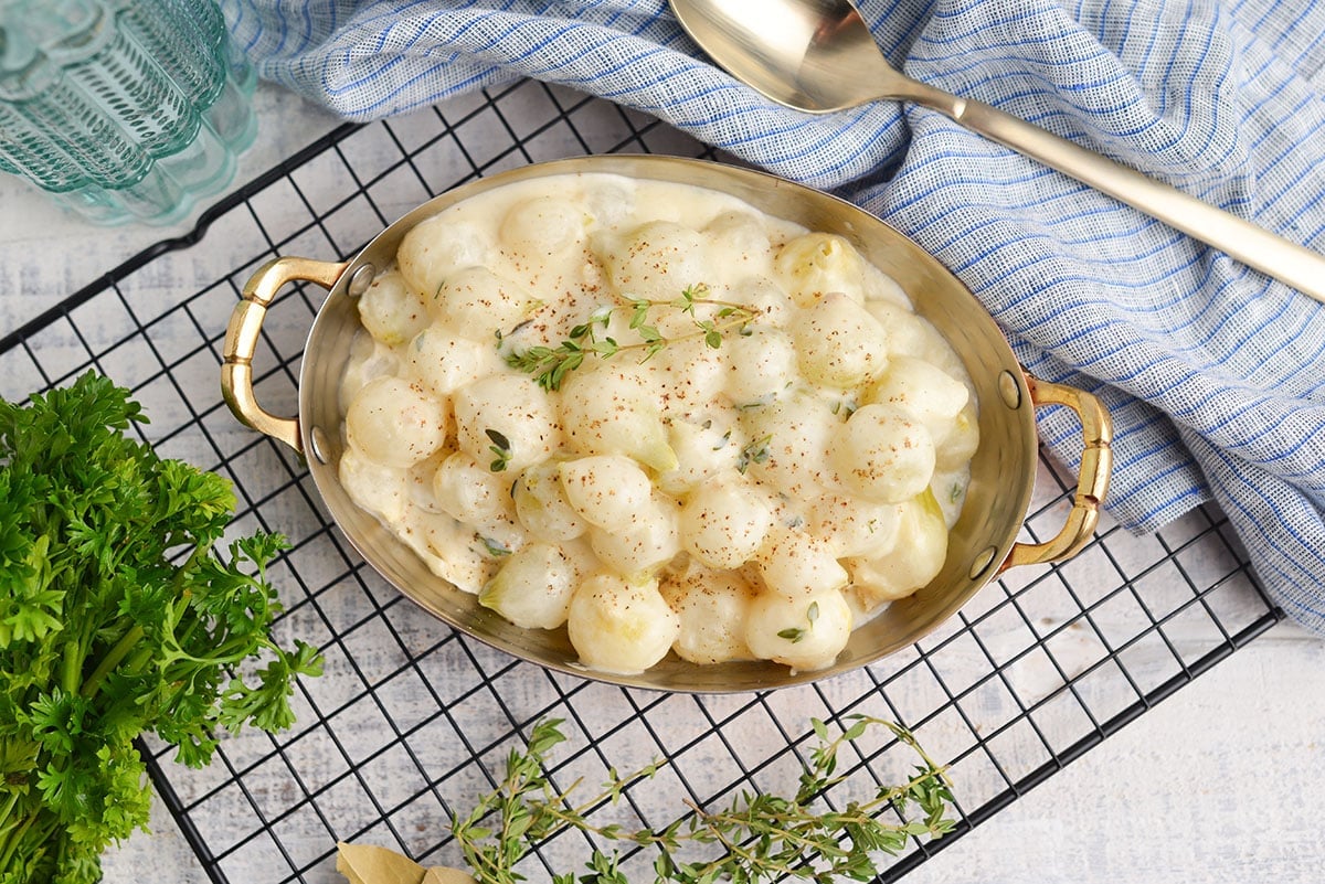 creamed onions in a serving dish