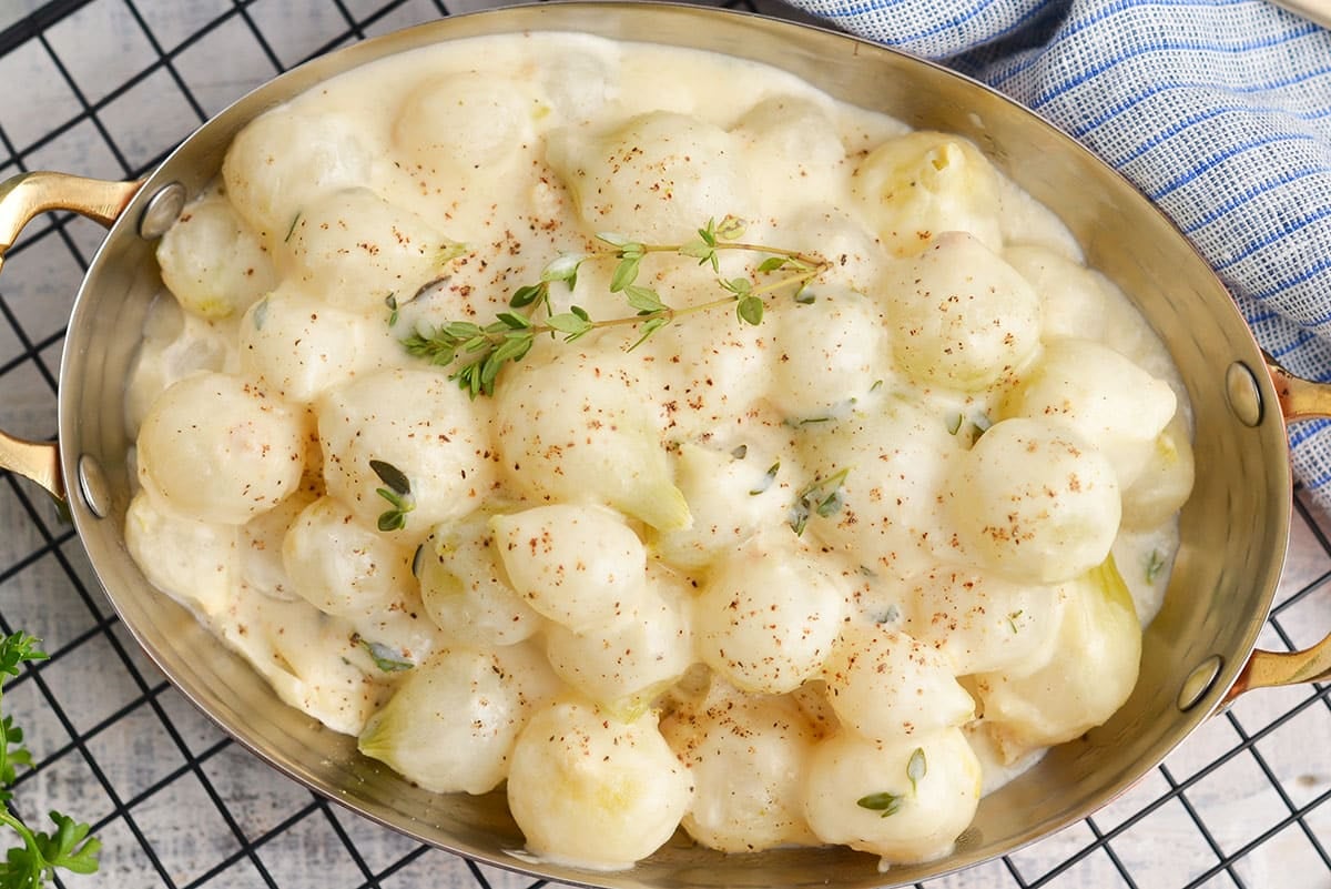 overhead shot of dish of creamed onions