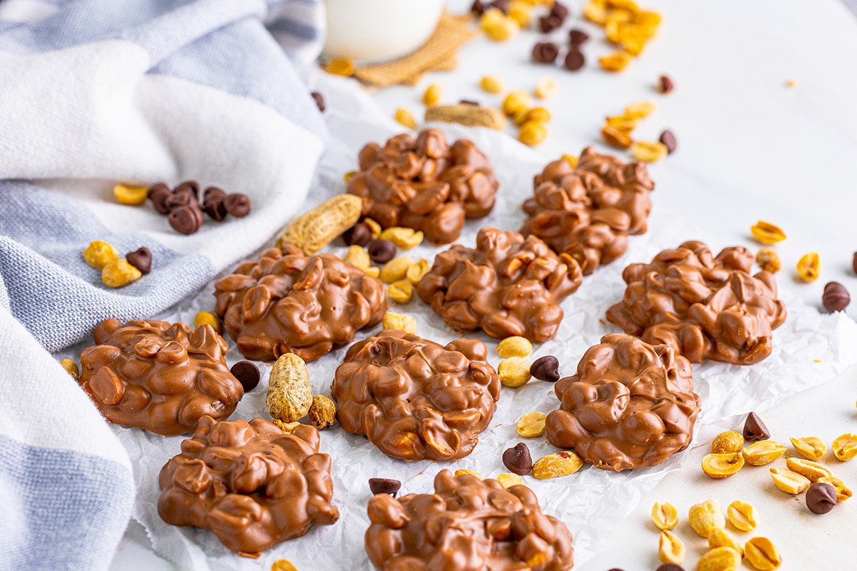 crockpot peanut clusters on parchment paper